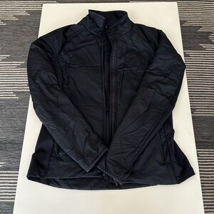 Black lululemon light weight, Size 12, thumb holes and back zipper pocket.